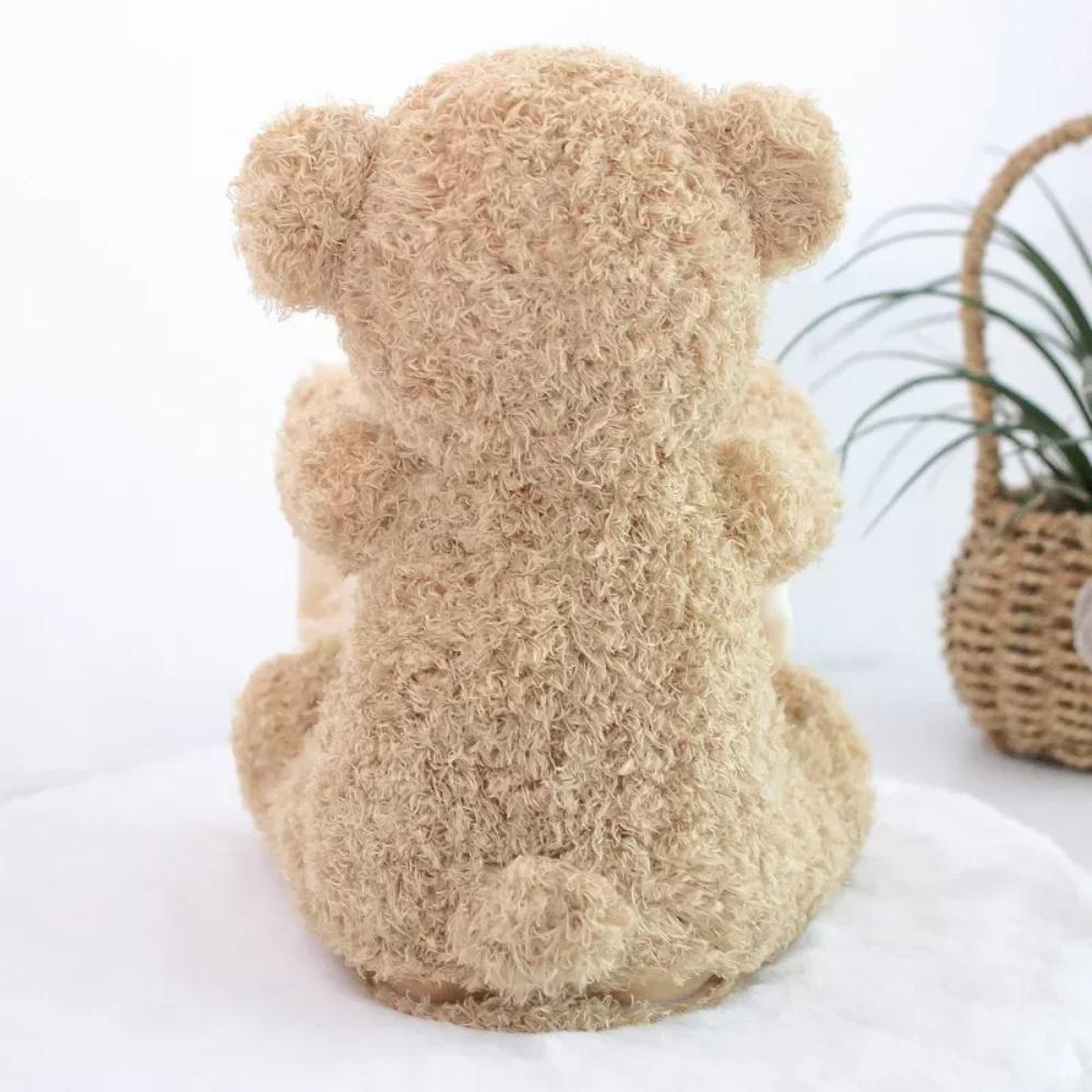 Interactive peek-a-boo bear plush toy for babies & toddlers. Unisex soft toy encourages sensory play & fun.