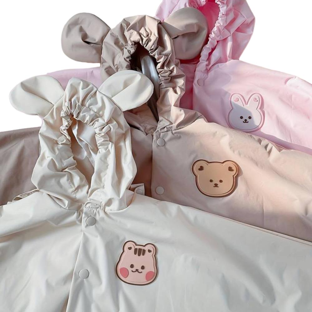 Vibrant cartoon print kids raincoat. Waterproof and durable for all-season fun. Unisex toddler rain poncho.