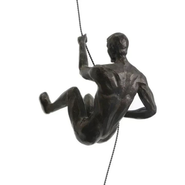 Figurative climbing men wall sculpture set, contemporary art for modern spaces.