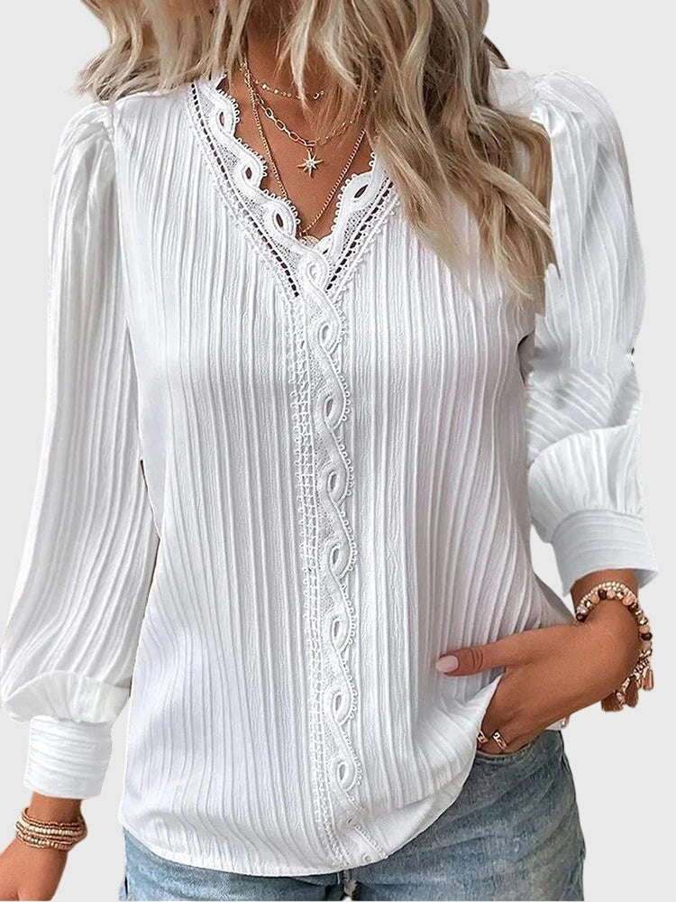 Dressy yet casual women's elegant pullover blouse. Long sleeve, round neck, perfect for versatile everyday wear.