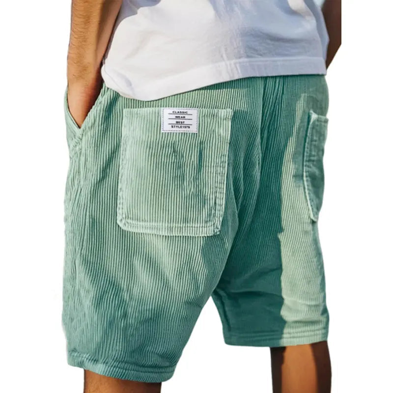 Versatile men's textured tailored shorts, ideal for refined casual summer style.
