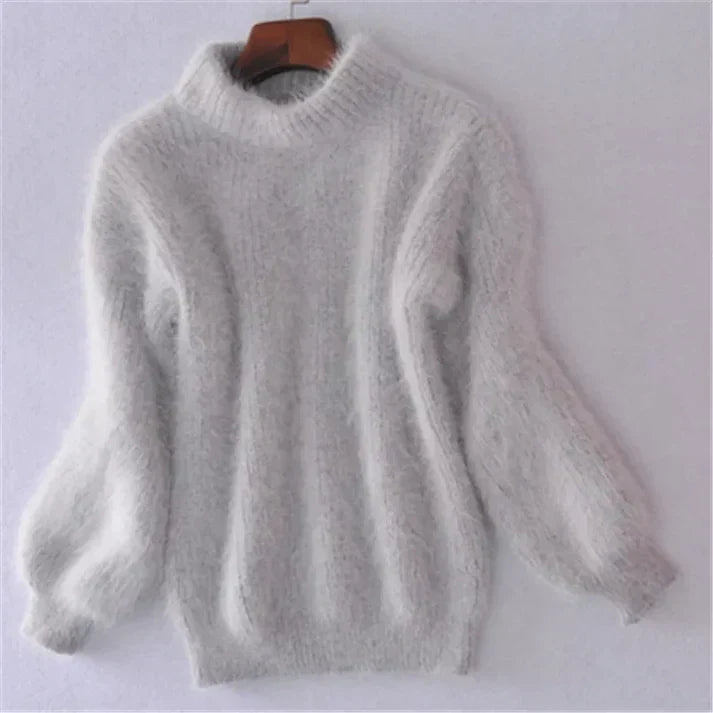Model wearing a comfortable women's vintage-inspired long sleeve pullover sweater, casual and stylish.