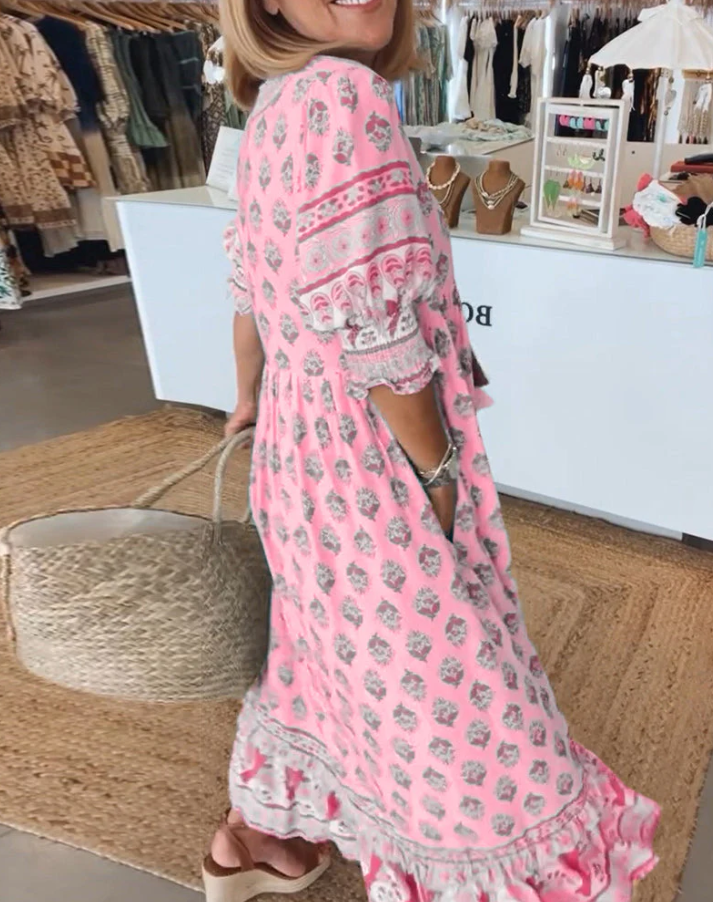 Versatile women's summer dress in a flattering design. Perfect for casual comfort or elegant occasions.
