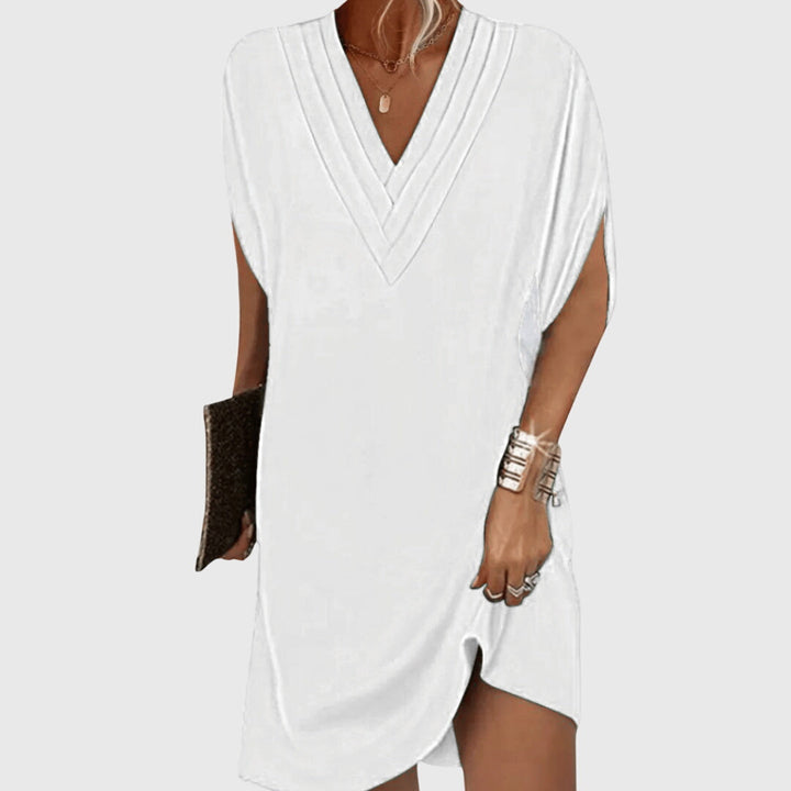 Women's flattering V-neck midi dress with tummy control. Elegant, comfortable, and versatile for any summer occasion.