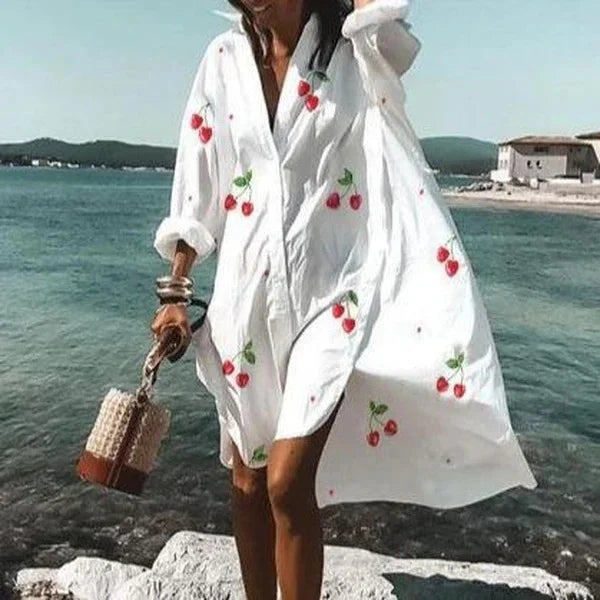 Women's casual polo shirt dress, mid-length design for comfortable everyday style.