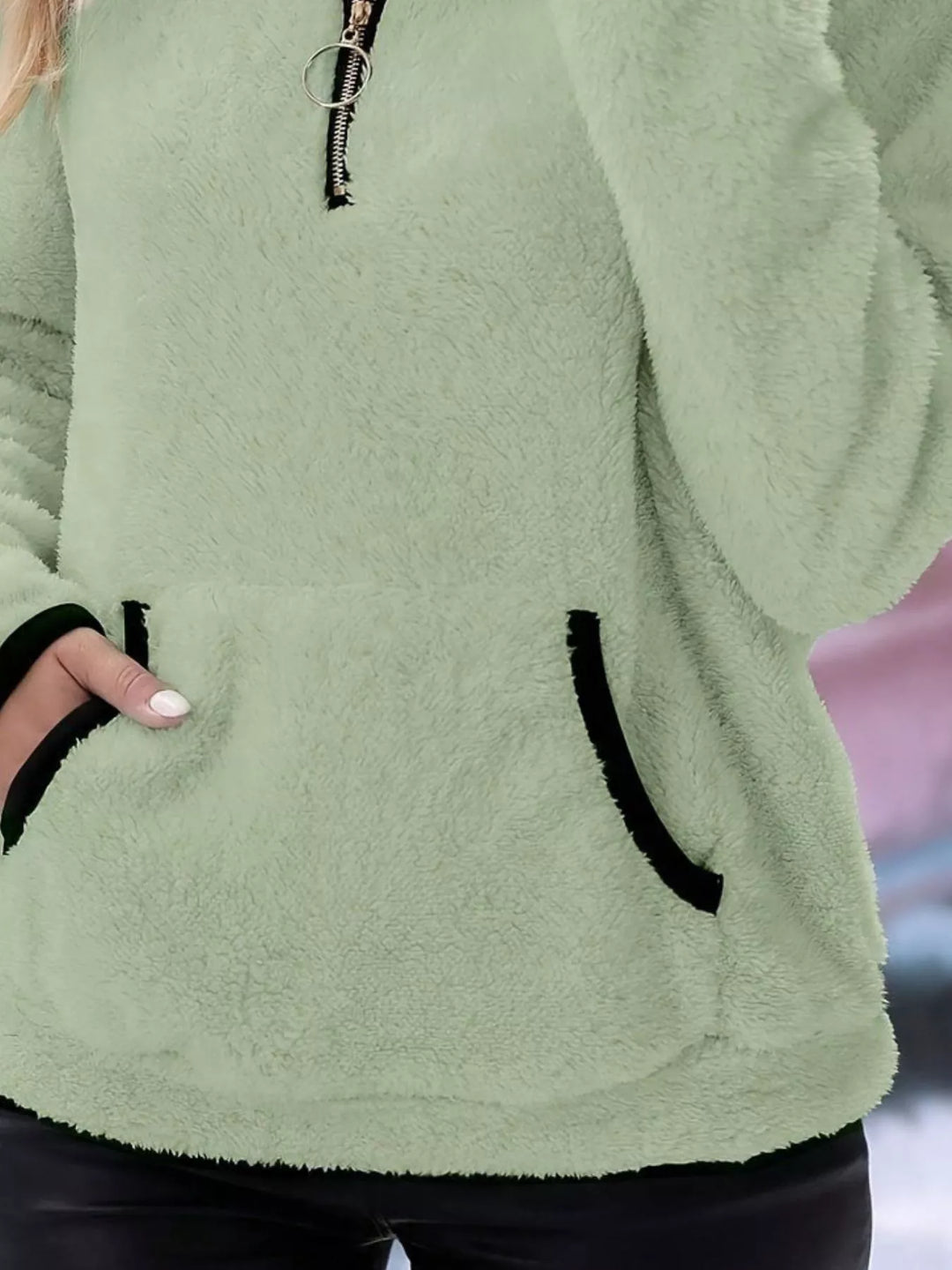 Comfortable women's half-zip pullover, essential for winter style & warmth.
