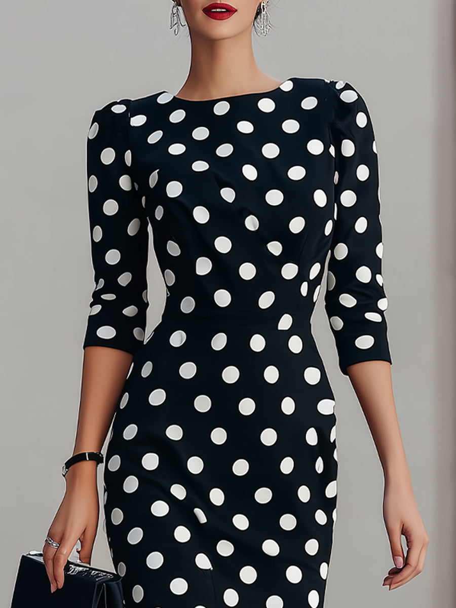 Women's black halter neck bodycon midi dress with dot print, a stylish choice for cocktail or evening wear.