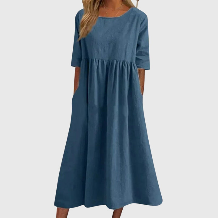 Versatile short sleeve midi dress for women, ideal for summer fashion, casual chic, or elegant events.