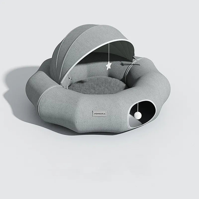Plush, cozy pet bed for cats & small dogs, with a privacy roof & attached toy. Offers supreme comfort & a safe space.