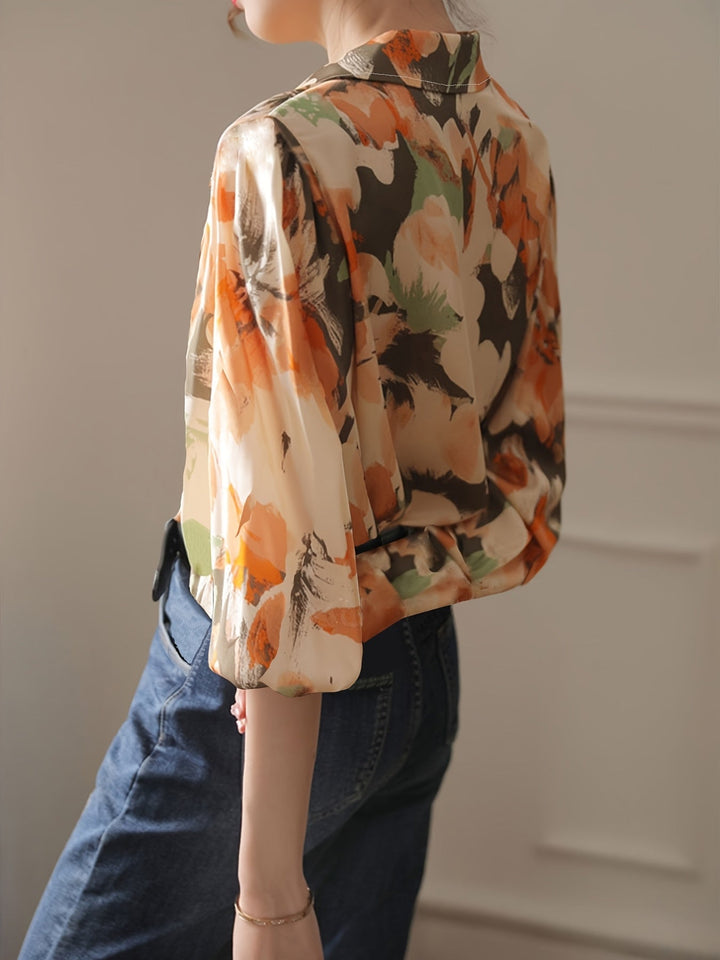 Women's elegant floral ink print blouse featuring a relaxed fit, ideal for versatile all-season styling.