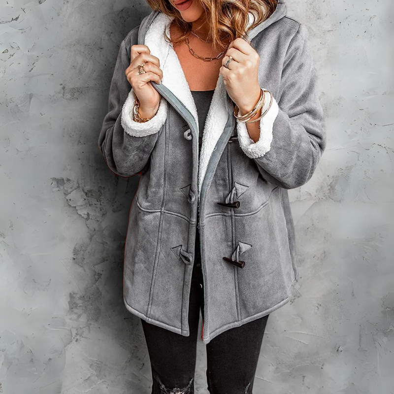 Warm women's winter toggle coat in soft Aspen fleece. Ideal for cozy outdoor fashion & chilly weather.