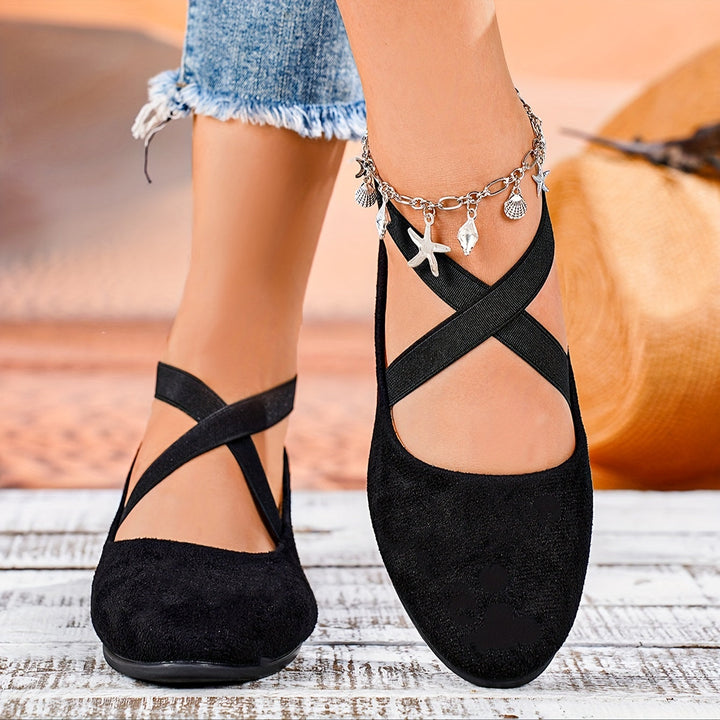Chic women's flat wedge sandals with a modern design, ensuring comfort and style for versatile all-day wear.