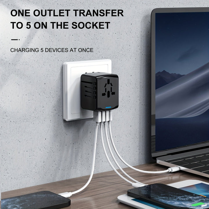 Universal travel adapter featuring 4 USB ports & 1 Type-C for fast international charging of all devices.