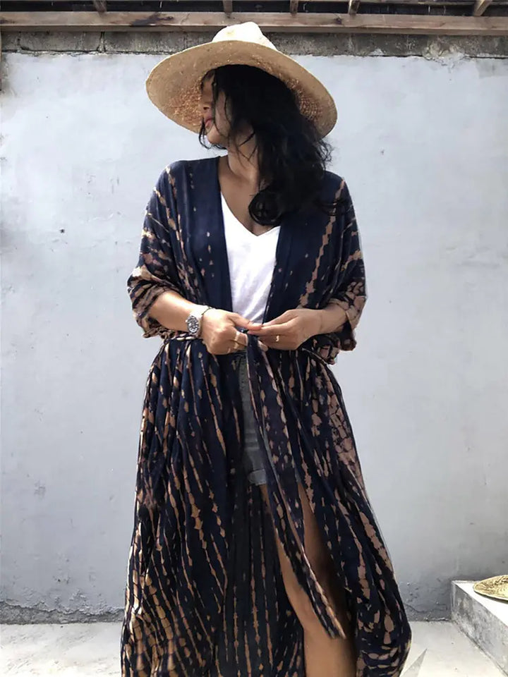 Boho chic flowy swimsuit cover-up for women, perfect for summer days.