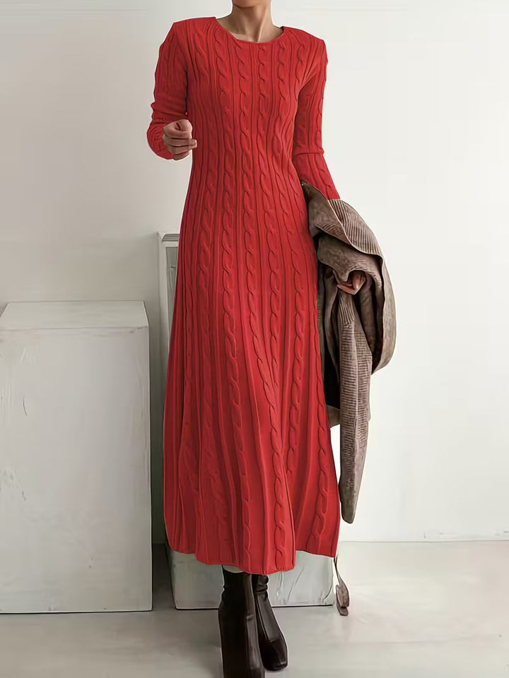 Black women's midi knitted dress, featuring a comfortable and elegant design. Perfect for fall/winter fashion.