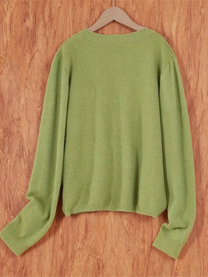 Elegant women's knit cardigan, a versatile cozy sweater for effortless fall fashion.
