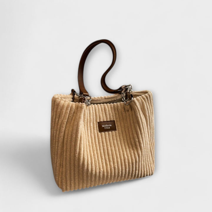 Versatile soft corduroy women's shoulder bag. Can be worn as a casual shoulder or crossbody bag.