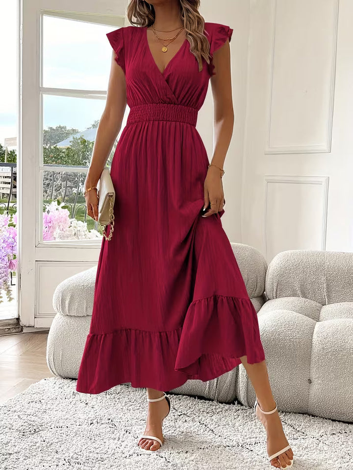 Chic sleeveless V-neck ruffled midi dress, a sophisticated and comfortable choice for women's summer fashion.