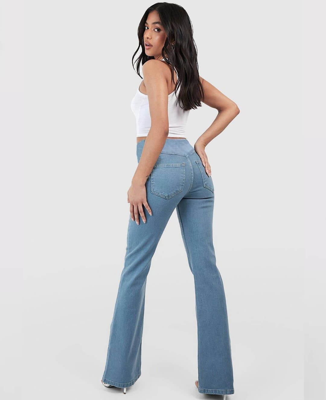 Grey women's high-waist stretch denim jeans, ideal for comfortable everyday casual fashion.