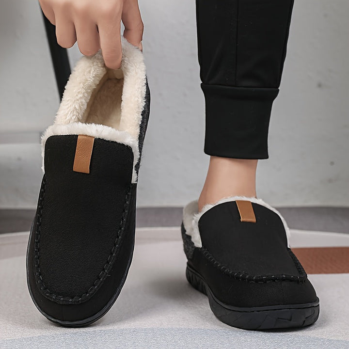 Luxurious men's slippers featuring a plush sheepskin lining for warmth & comfort. Ideal indoor footwear.