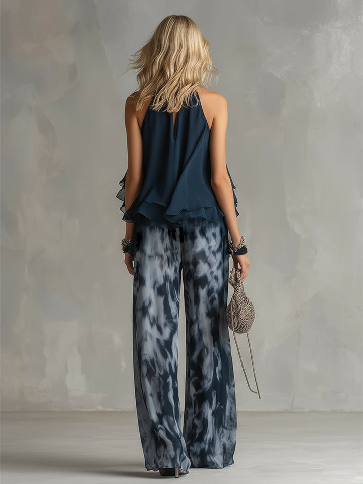 Navy blue women's two-piece set for versatile fashion. Includes a stylish turtleneck top and comfortable wide-leg trousers.