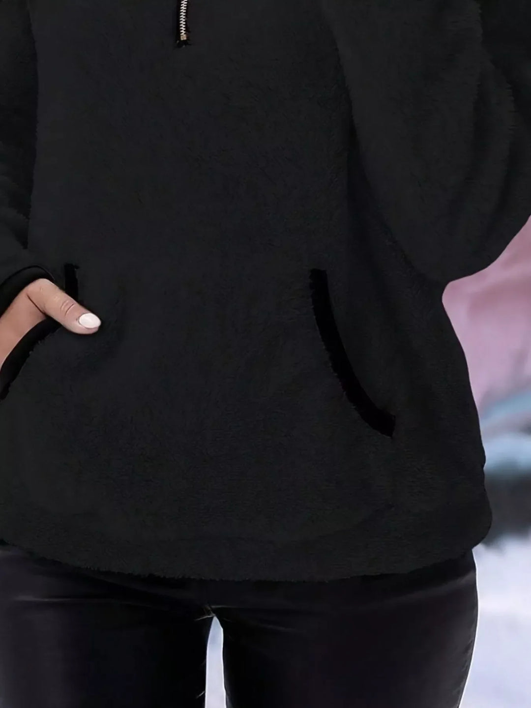Stylish women's half-zip sweater, ideal for cozy autumn and winter outfits.