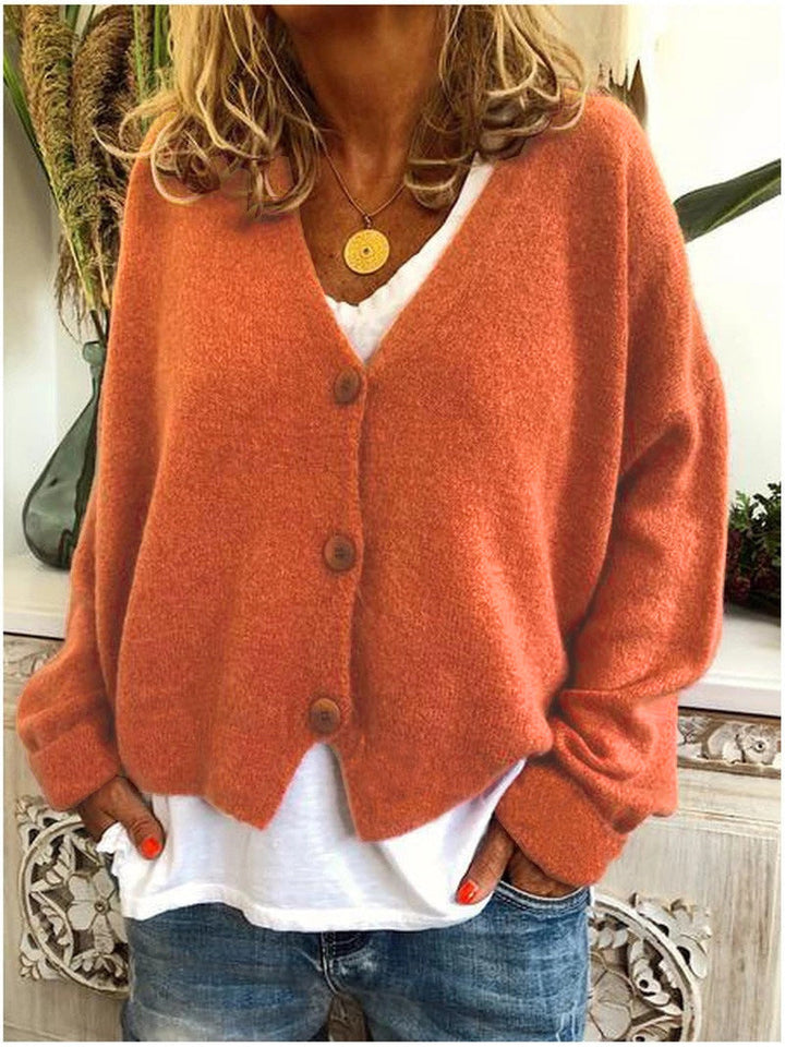Stylish women's long sleeve V-neck cardigan with button front, perfect casual outerwear.