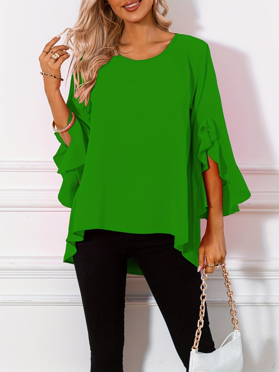 Modern women's round neck top, embodying effortless spring fashion and ladies' comfort.