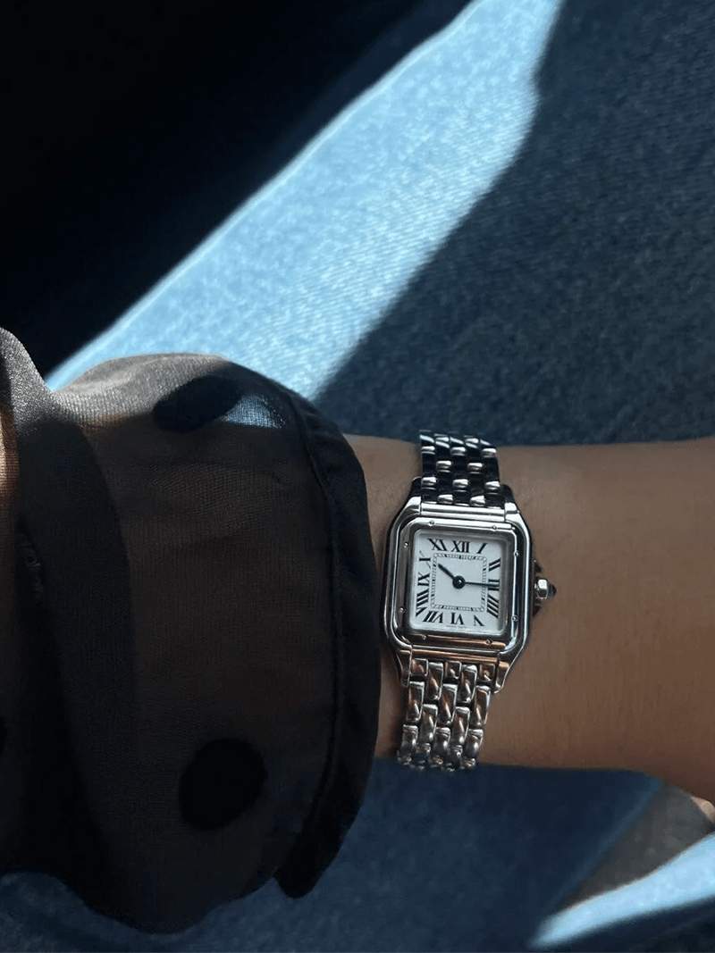 Premium women's square quartz watch displayed elegantly, a modern fashion accessory.