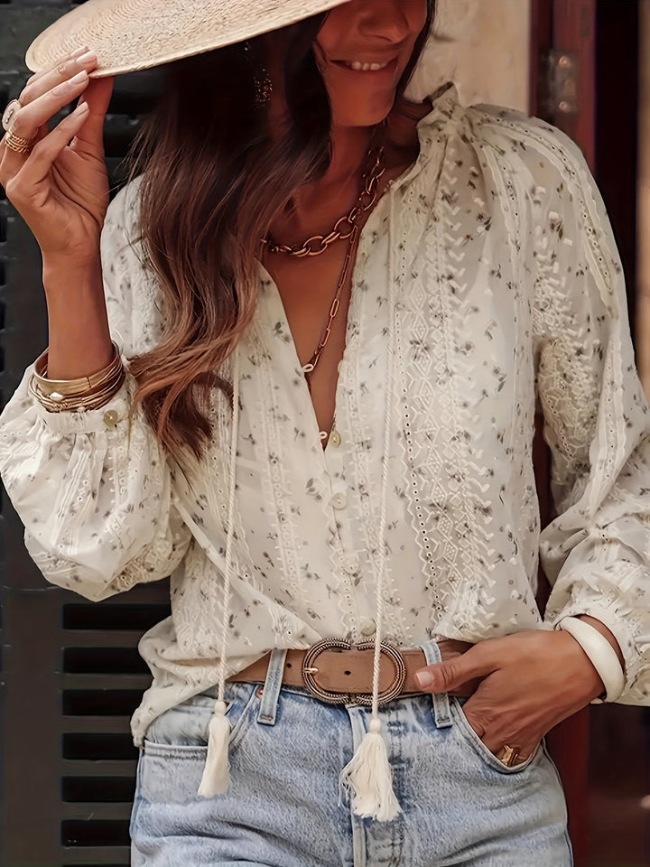 Chic women's floral V-neck blouse with a relaxed, elegant fit. Ideal for casual, office or spring/summer fashion.