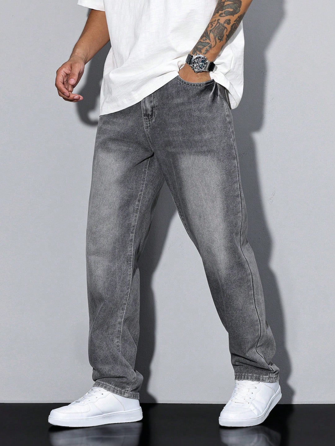 Men's washed straight leg denim jeans, loose fit for casual comfort and everyday wear.