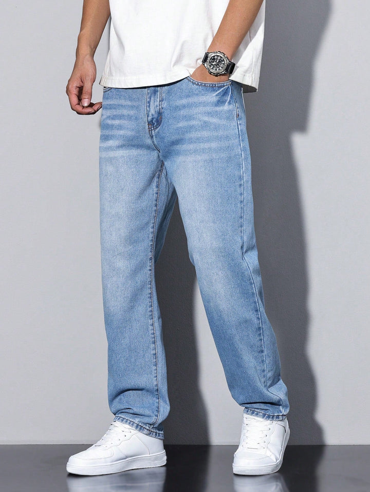 Men's comfortable washed denim trousers, straight leg design for all-day casual wear.