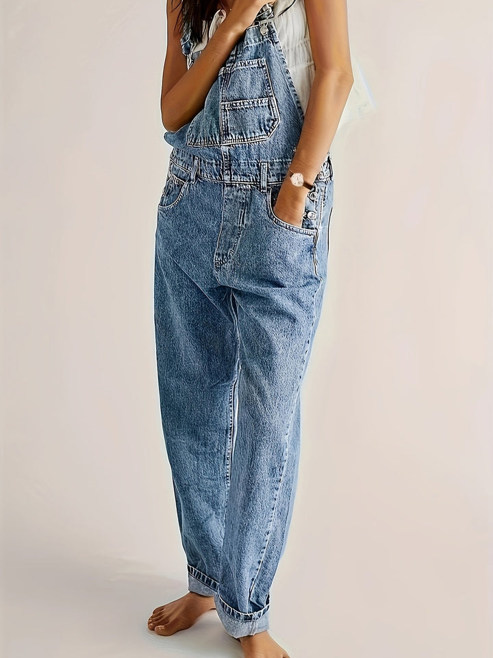 Women's denim dungarees, loose fit overalls styled with a white tee, perfect casual fashion look.