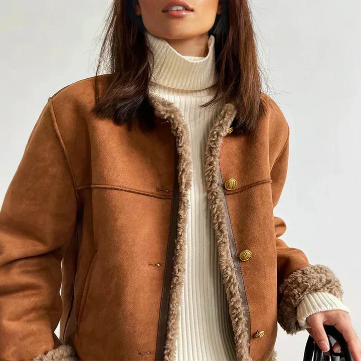 Chic women's Lila faux shearling jacket. Elegant & warm winter coat with button-down style.