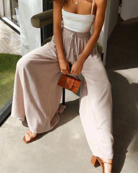 Women's Lily wide-leg trousers with elastic waist, designed for ultimate comfort & chic style.