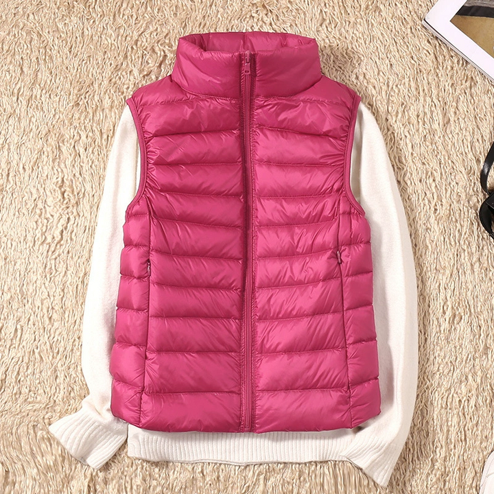Elegant women's quilted vest, a chic sleeveless piece for sophisticated layering.