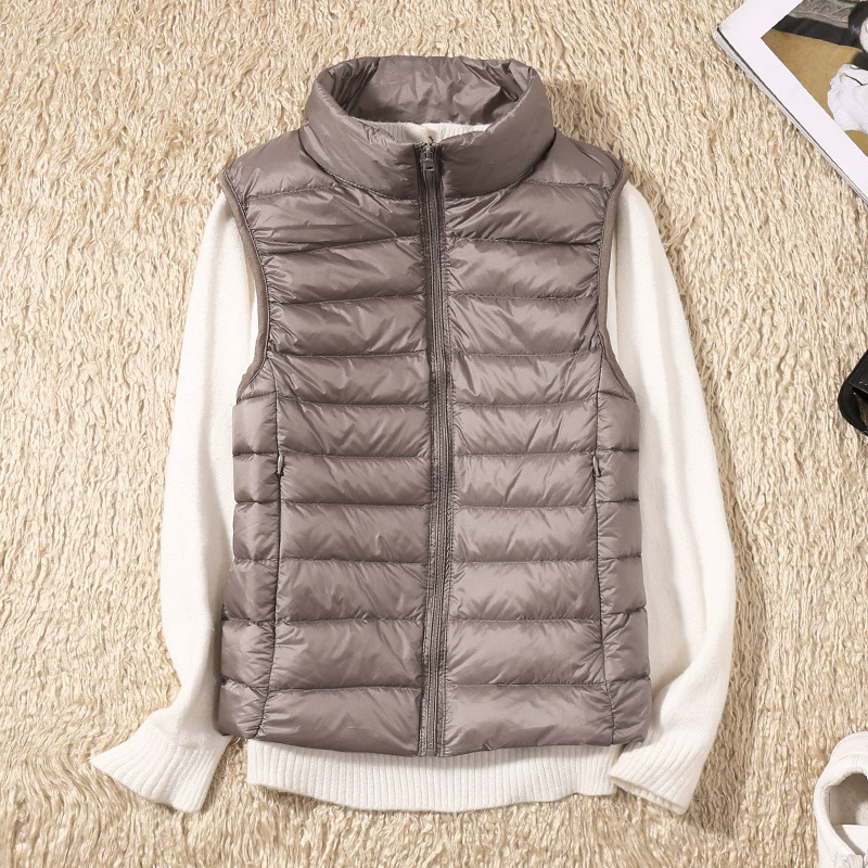 A versatile women's quilted sleeveless vest, great for casual or chic layering outfits.