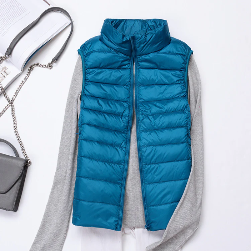 This chic women's quilted vest offers stylish sleeveless layering and warmth.