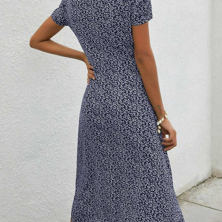 Women's navy blue airy flowy midi summer dress. Elegant & comfortable for everyday wear or vacation.