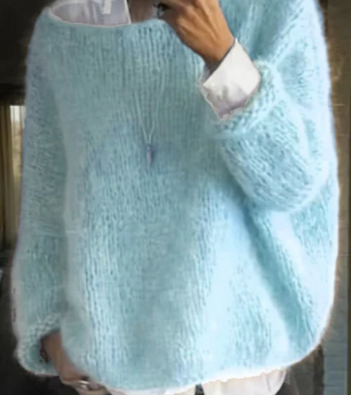 Soft knit women's oversize pullover, offering cozy comfort and relaxed everyday style.