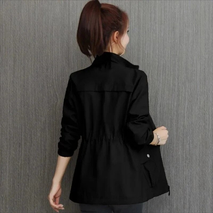 Stylish women's lightweight short jacket. Ideal everyday outerwear for warm weather, offering effortless chic.
