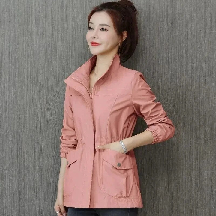 Elegant short lightweight women's jacket. A stylish transitional piece, great for spring, summer, or fall outfits.