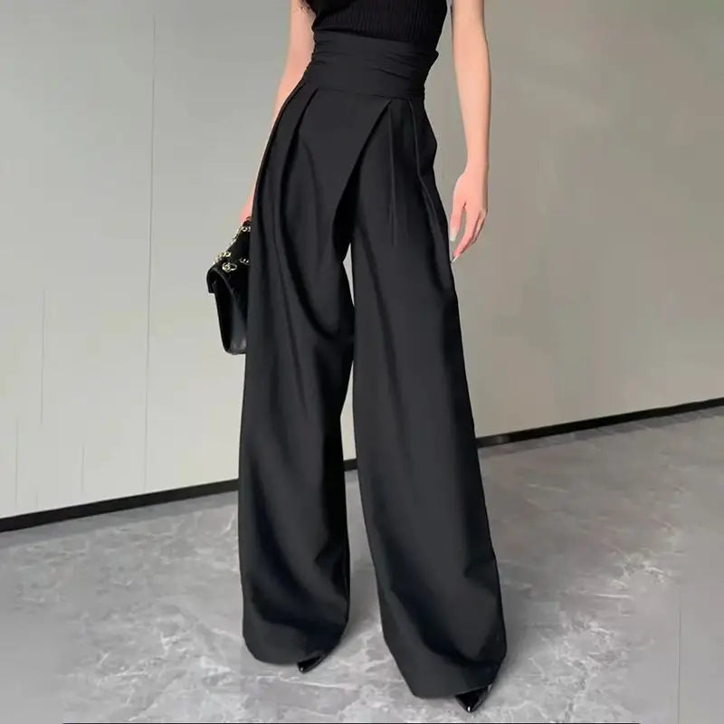 Elegant women's high-waisted wide-leg trousers with unique crossed waistband, perfect for work or casual chic style.