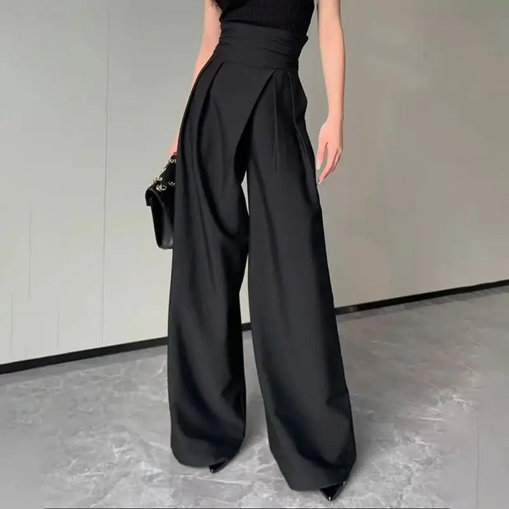 Elegant women's high-waisted wide-leg trousers with unique crossed waistband, perfect for work or casual chic style.