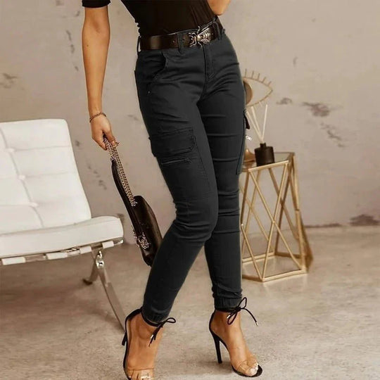 Utility style women's cargo jeans, relaxed fit, multiple functional pockets, great for streetwear.