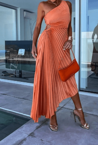 Glamorous women's one-shoulder pleated maxi dress. Ideal for elegant party wear, formal events, and wedding.