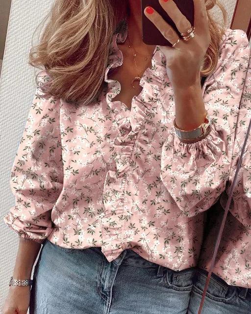 Versatile women's long sleeve top with delicate ruffles, a sophisticated and stylish blouse.