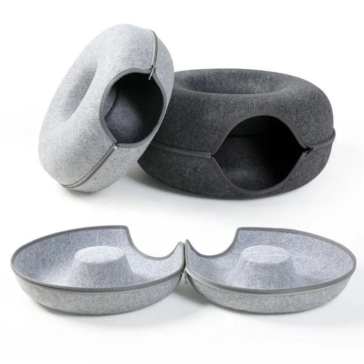 Grey felt cat donut bed, a cozy & durable pet hideaway offering comfort and a secure space for your feline.