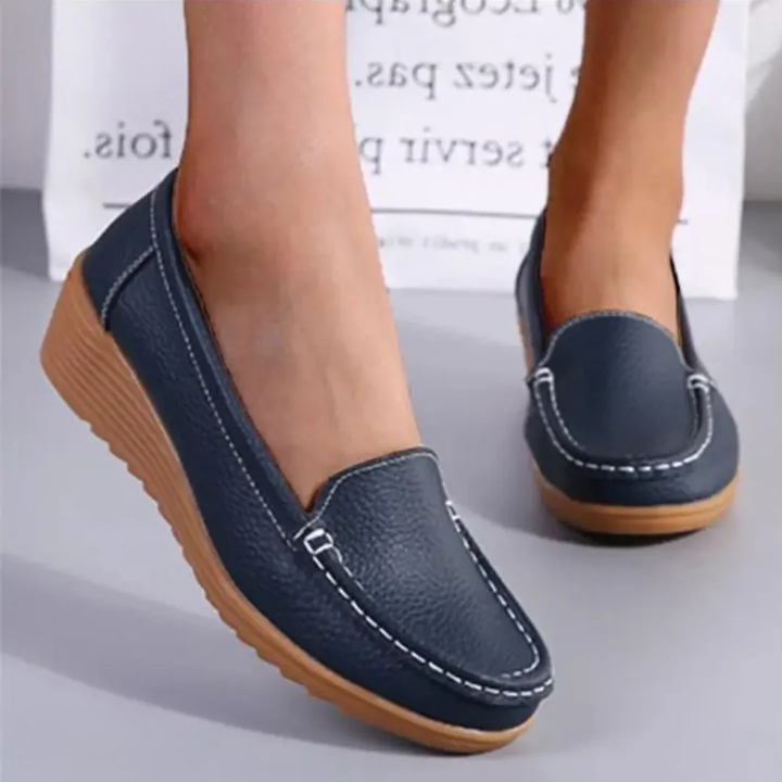 Women's orthopedic slip-on sneakers for all-day comfort, providing arch support and easy wear.