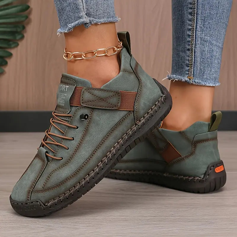 Close-up of women's wide fit orthopaedic trainers, featuring breathable fabric for daily wear.